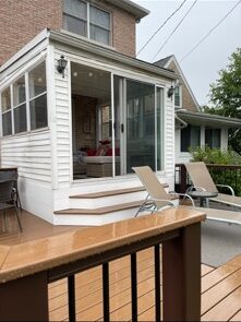 AFTER: finished sunroom on the same deck