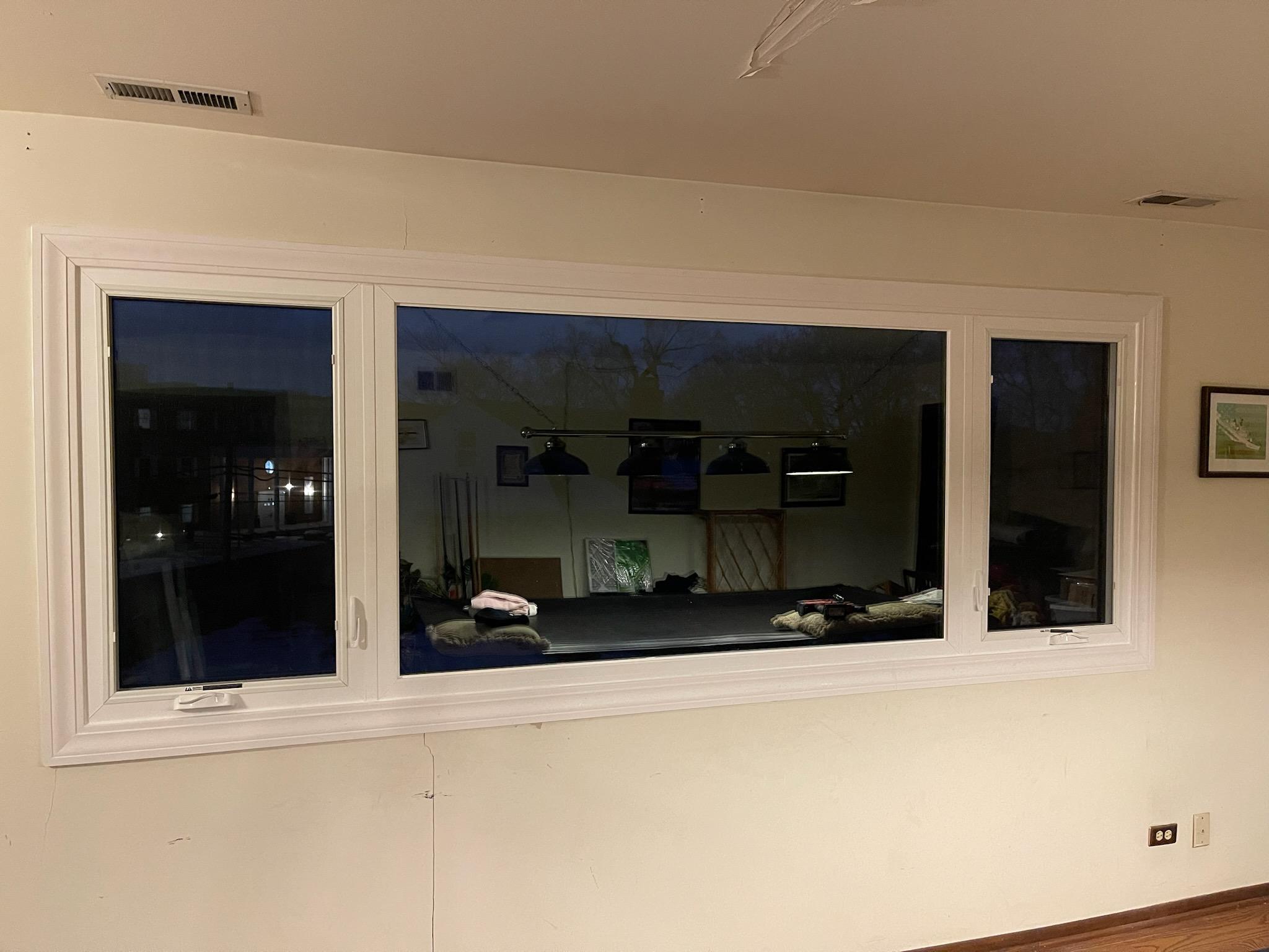 Picture window with flanking casements