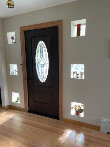 Entry door with oval glass