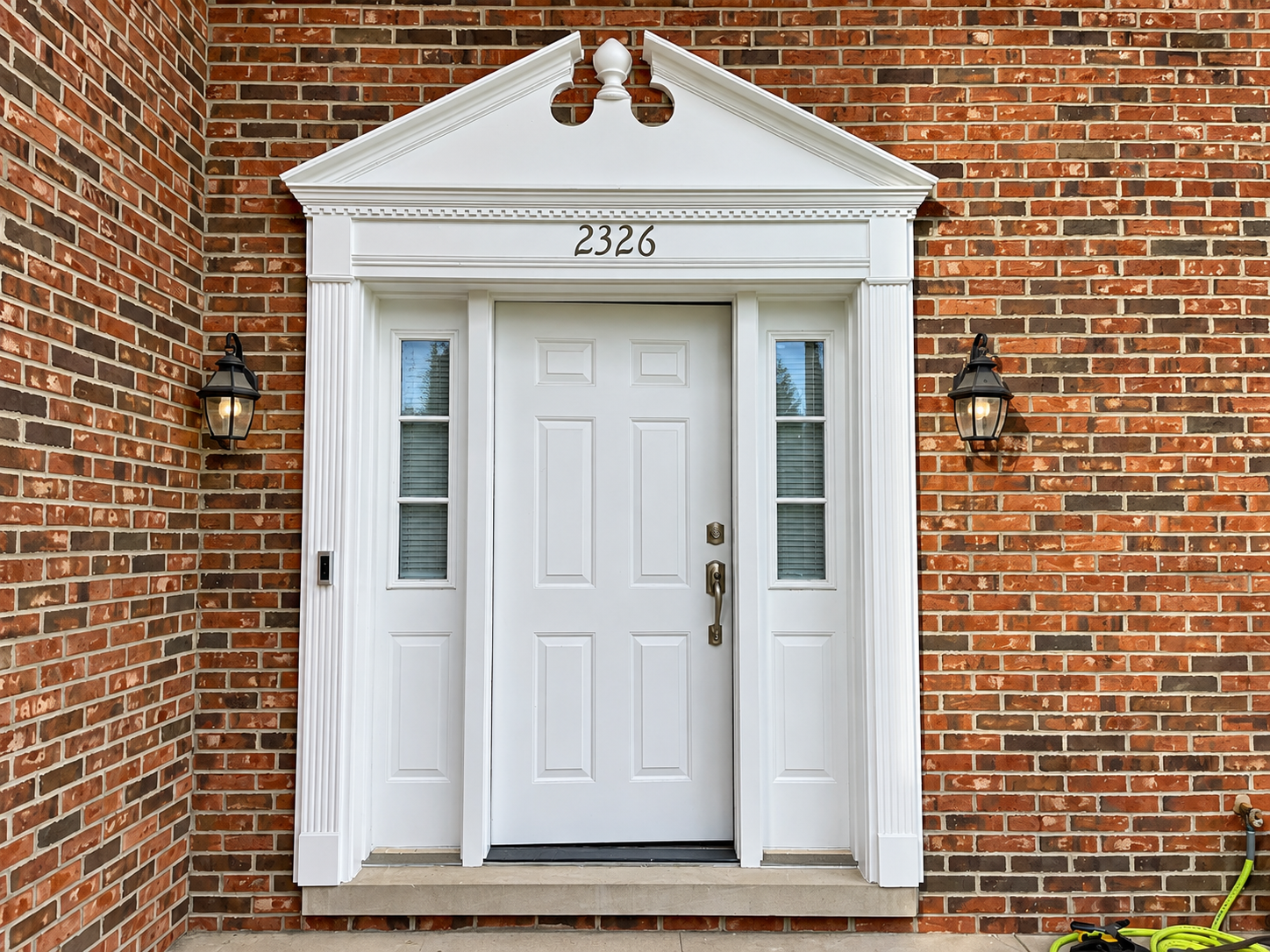 BEFORE: original front entry door