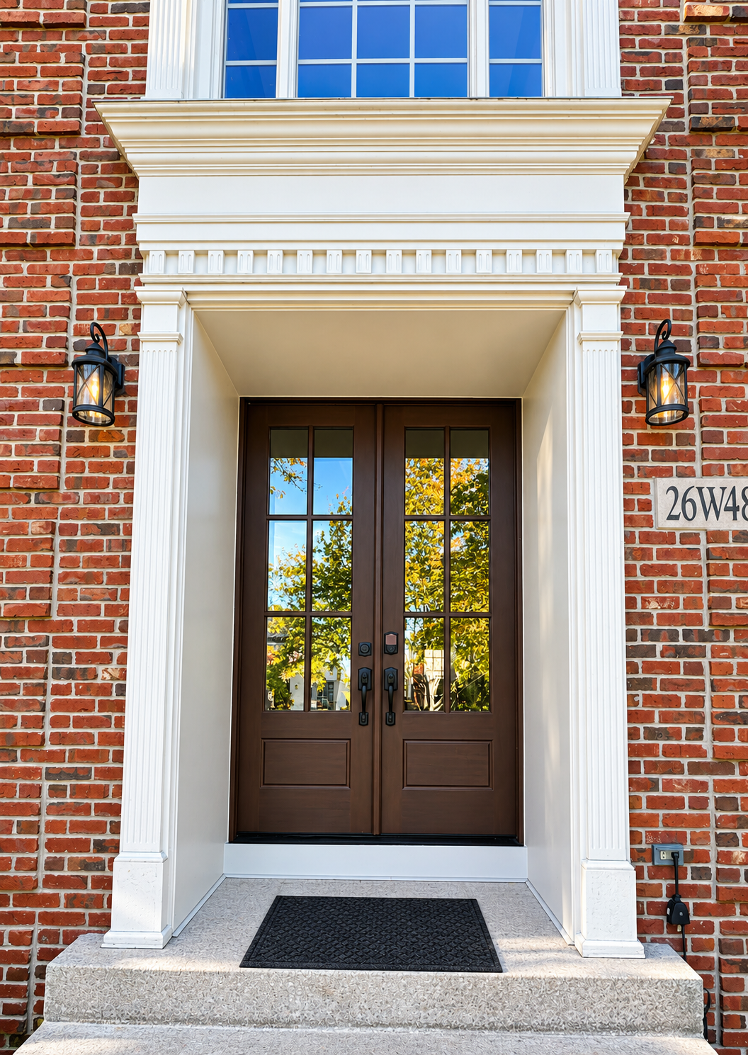 Pella double entry doors, brick exterior