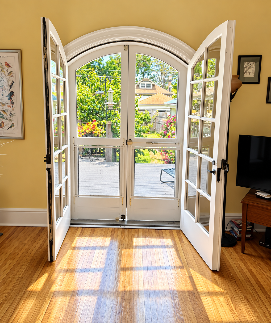 Arched French doors, open