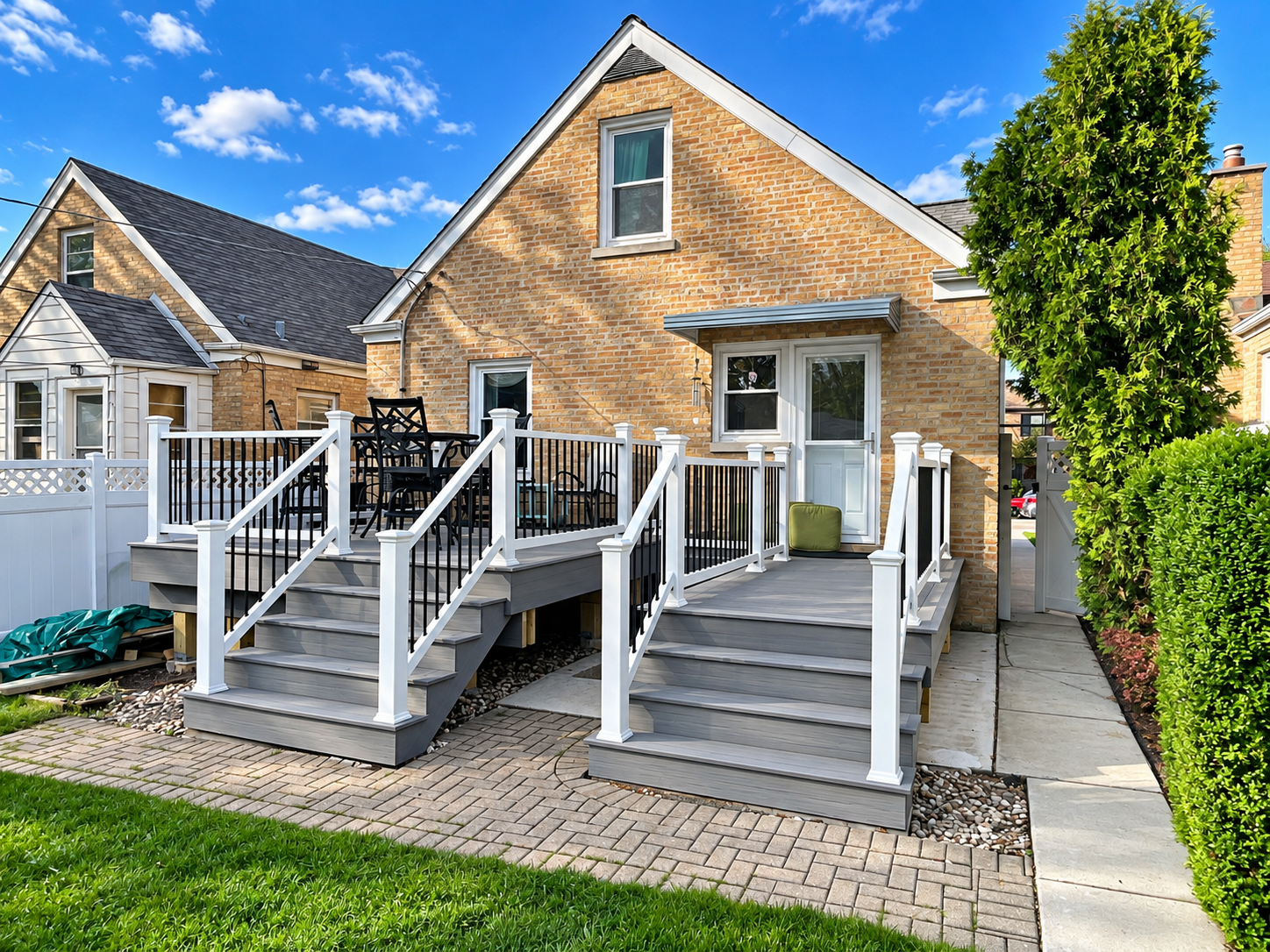 Composite deck with white railing and stairs