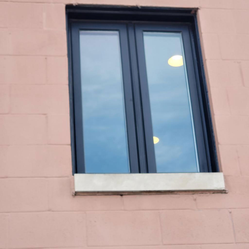 Pella Impervia fiberglass window, exterior twilight view