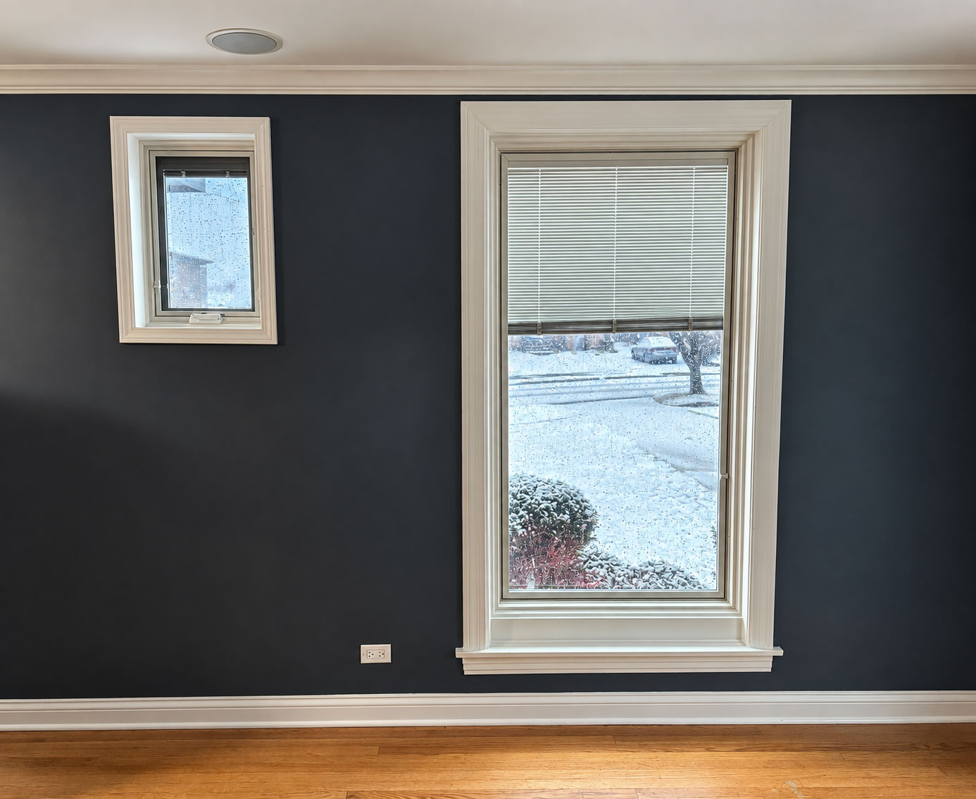 Pella Lifestyle Series wood casement windows with blinds