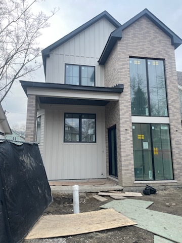 Board & Batten Brick Home