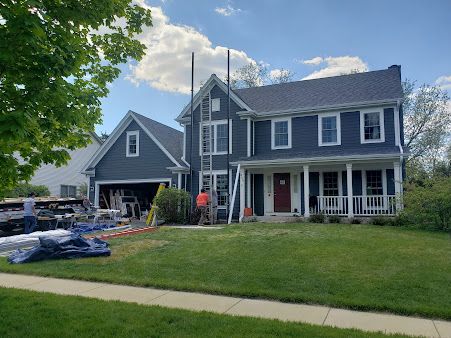 Navy Lap Siding Home