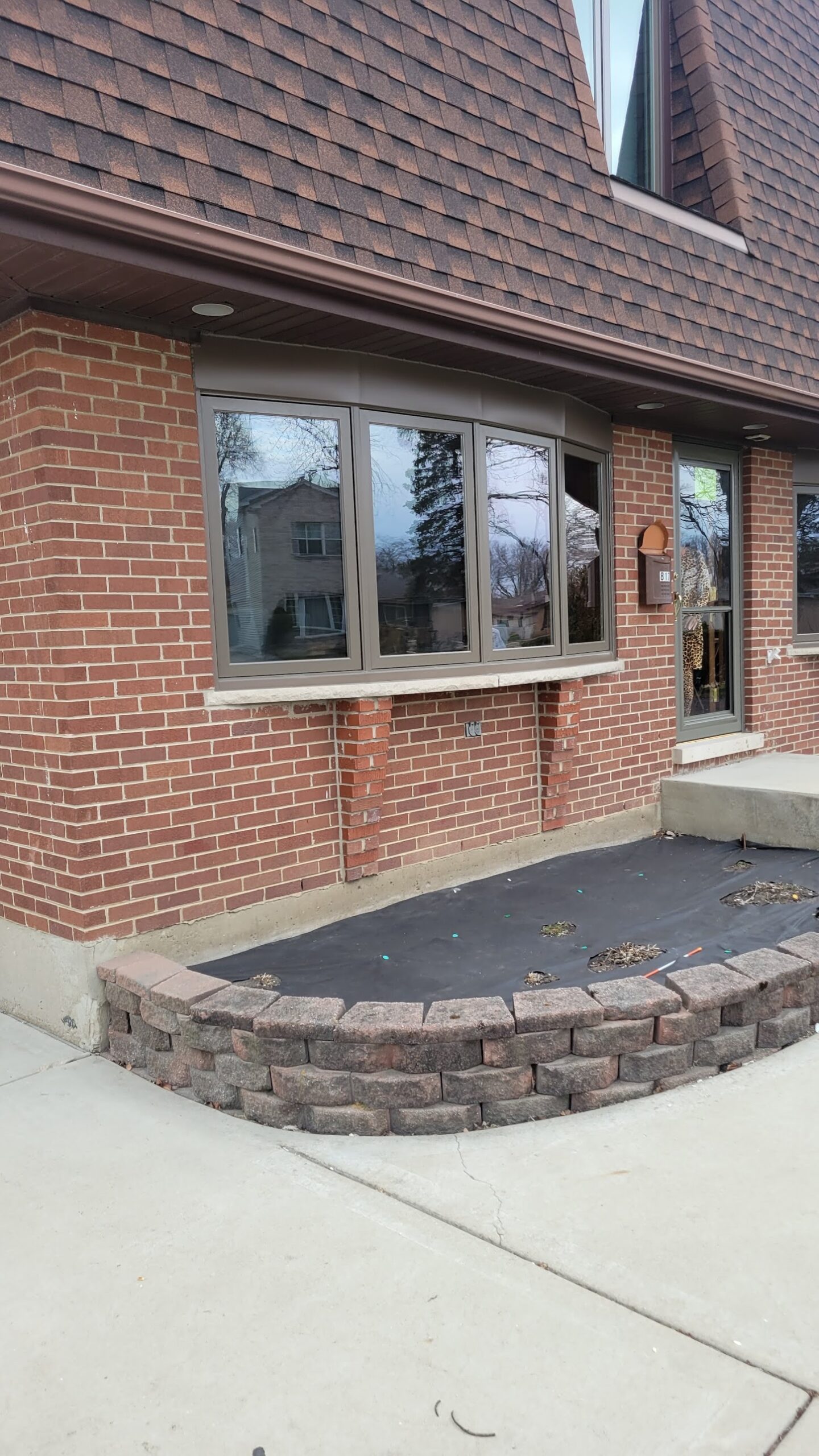Bow Window Brick Home